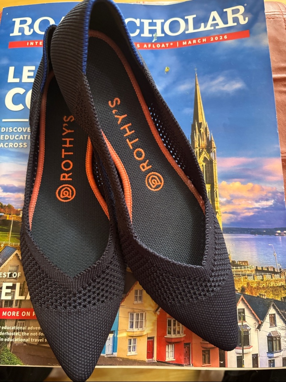 Rothy's Black Pointed Knit Flats with Orange Insole Detail